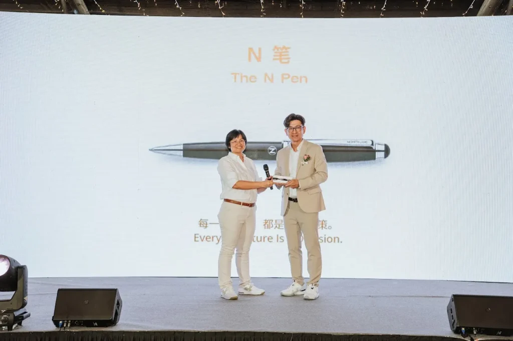 Ex Chairman Sophia Tey passes The N Pen to Mr Chang Kon Ling